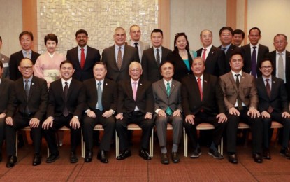 <p><strong>DUTERTE CABINET IN TOKYO.</strong> Cabinet members of the Duterte administration and top officials of the Japanese government pose for a photo during the Philippine Economic Briefing in Tokyo, Japan on June 19, 2018. The Philippine government's economic team discusses ways of expediting the administration's flasghip infrastructure programs and briefs investors on prospects for the Philippine economy. <em>(Photo courtesy of Sec. Martin Andanar)</em></p>